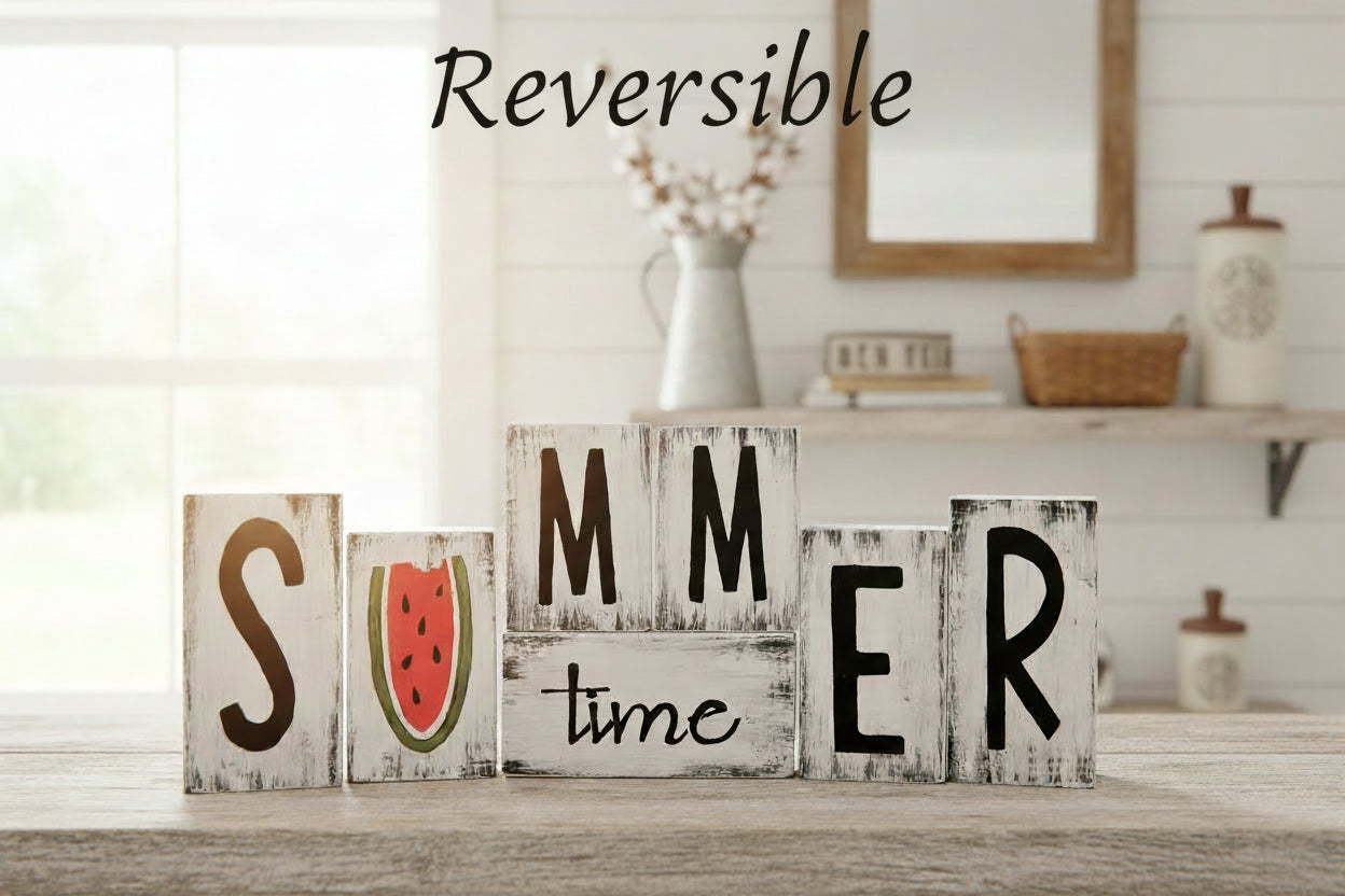white distressed wood blocks that sit on a shelf. Hand painted SUMMER time in black letting with watermelon missing a bite as the U on distressed white block.