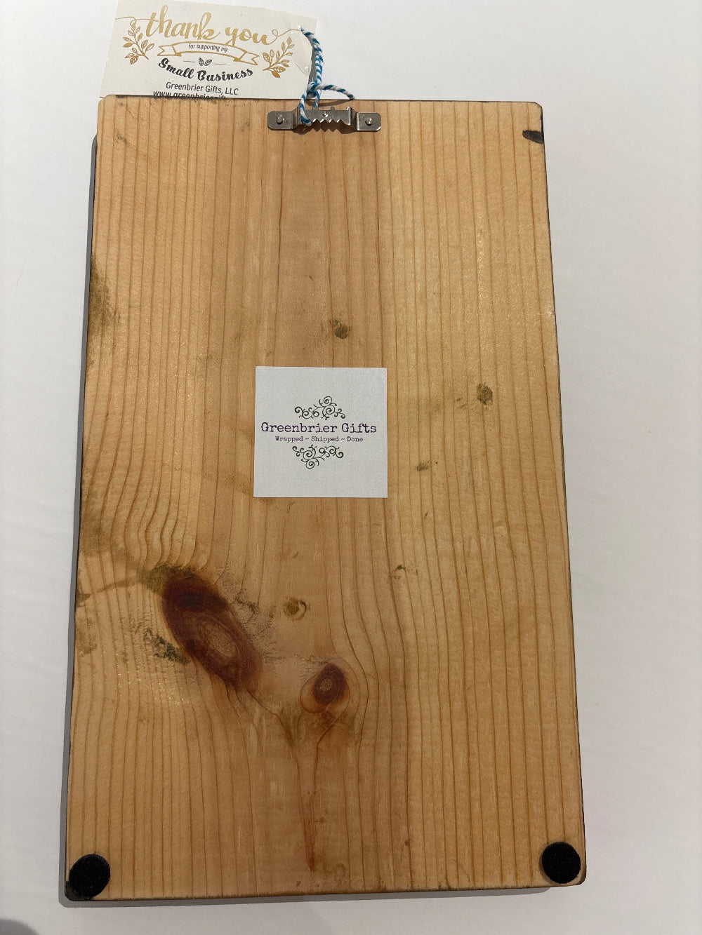 back of handcrafted wood sign
