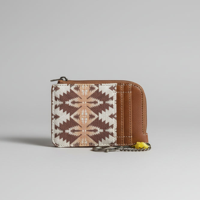 Small wallet with geometric pattern on a white background