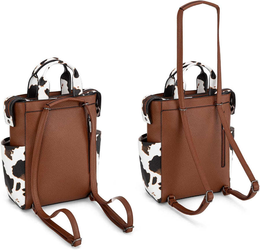 Brown leather backpack with cow print accents on a white background