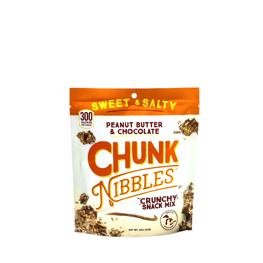 Packaging of Chunk Nibbles crunchy snack mix with peanut butter and chocolate flavor on a white background.