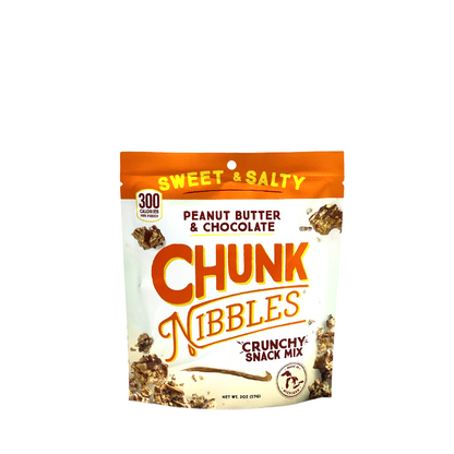 Packaging of Chunk Nibbles crunchy snack mix with peanut butter and chocolate flavor on a white background.