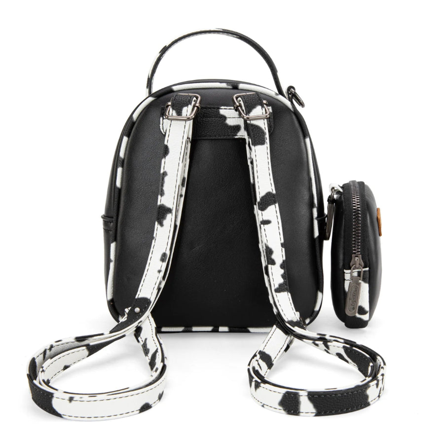 Black backpack with white cow print straps and accents on a white background