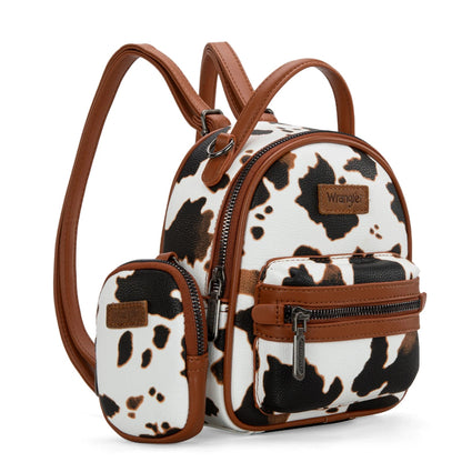Backpack with cow print pattern and brown accents and matching coin pouch on a white background
