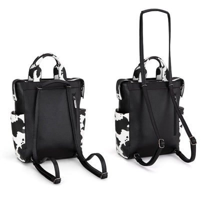 Black backpack with cow print accents on a white background
