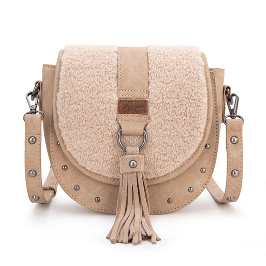 Beige crossbody bag with shearling texture on a white background