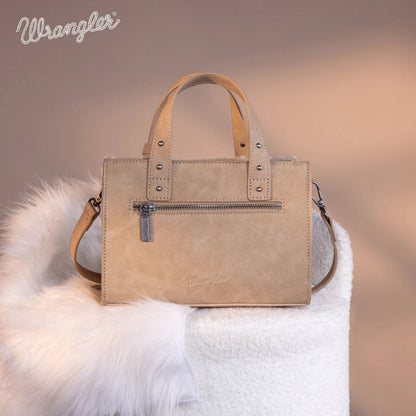 Beige handbag with 'Wrangler' branding on a soft white surface with a blurred background
