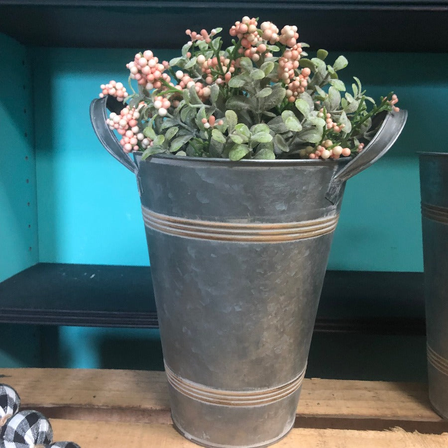 peach berry greenery in metal bucket with metal handles