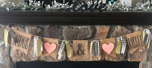 hugs and kisses banner garland with wood flag pennants and 3d hearts in blush pink