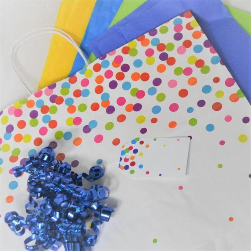 Rainbow Confetti Gift Bag with blue curly ribbon bow and coordinating name tag and tissue paper